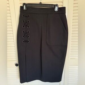 Black Raoul skirt with sexy slit and maxi eyelet detail